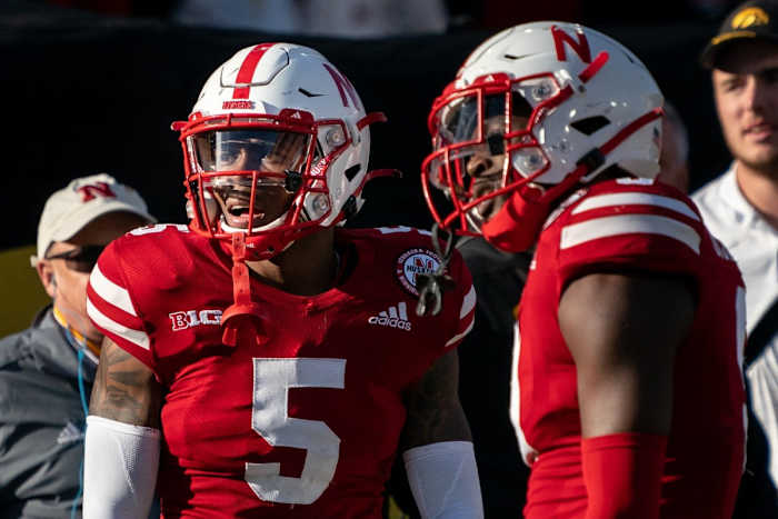 Nov 26, 2021; Lincoln, Nebraska, USA; Nebraska Cornhuskers cornerback Cam Taylor-Britt (5) reacts to a call during the third quarter against the Iowa Hawkeyes at Memorial Stadium. Mandatory Credit: Dylan Widger-USA TODAY Sports